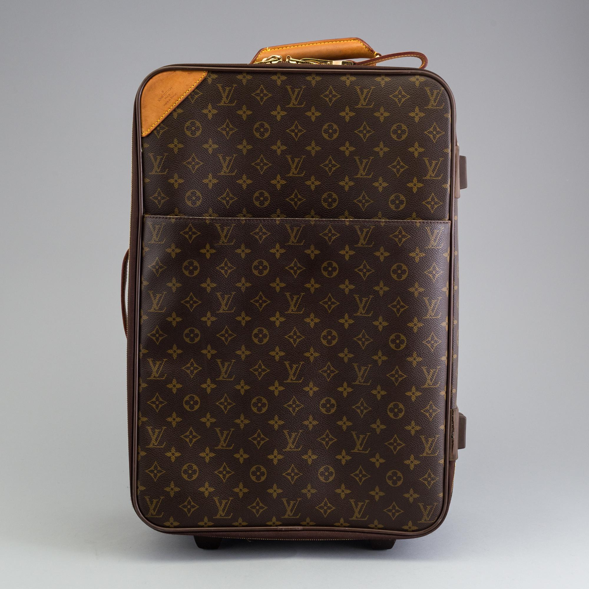 LOUIS VUITTON,  "Pégase 55", carry on suitcase on wheels.