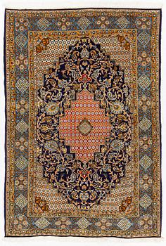 A Ghom/Shahreza rug, c. 202 x 140 cm.