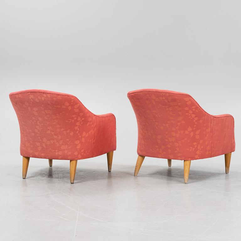 A pair of armchairs, later part of the 20th Century.