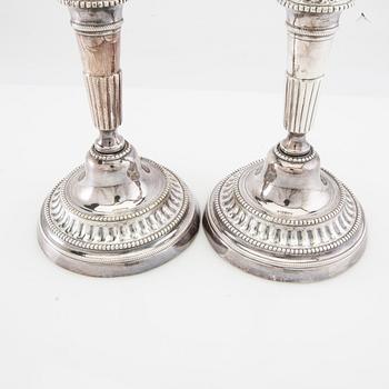 Candle holders, 2 pairs of silver-plated metal, first half of the 20th century.