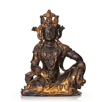 853. A cold gilt bronze figure of Avalokitshvara, Ming dynasty.