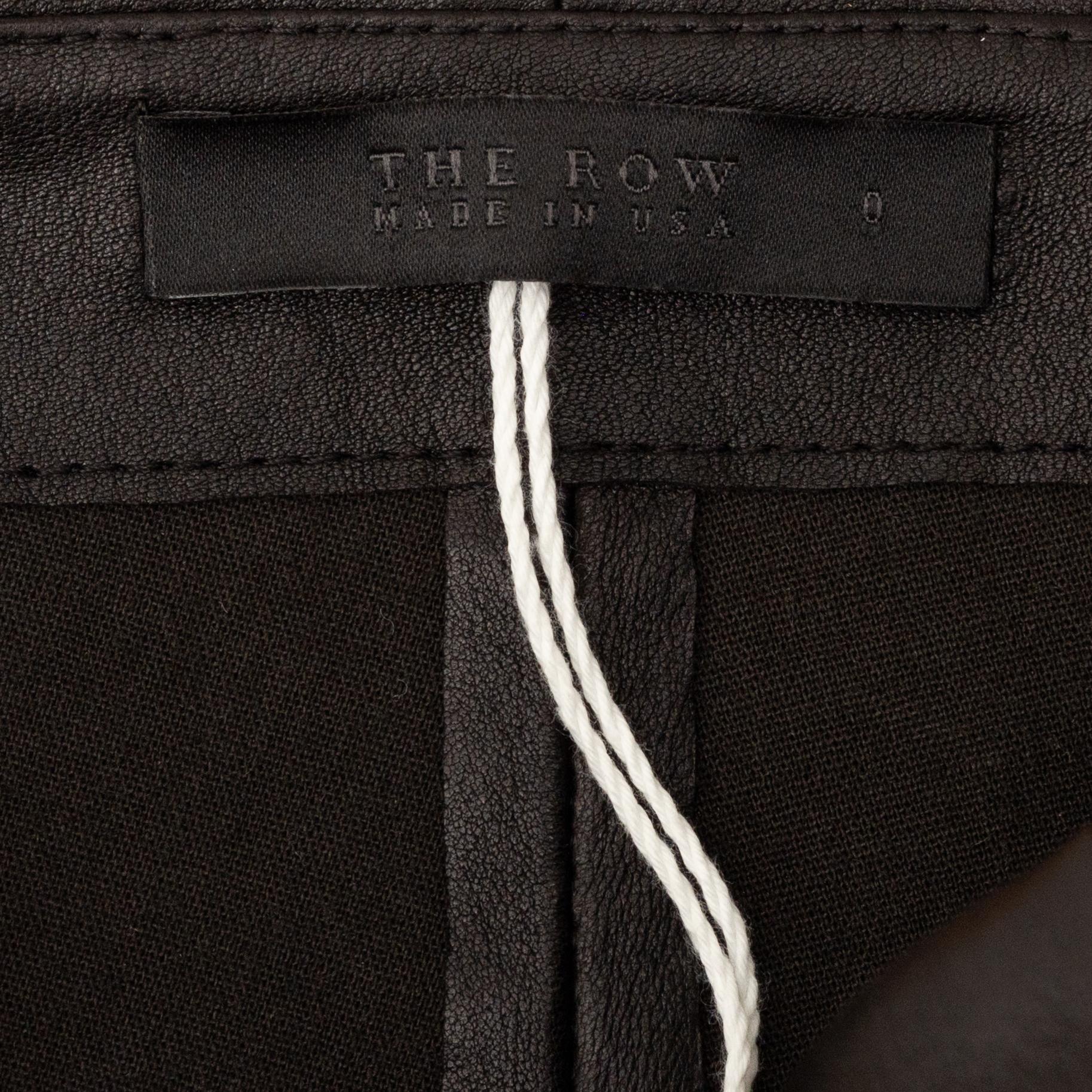 The Row, a black leather top and pants, size 0.