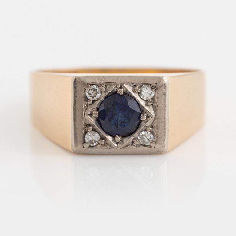 Sapphire and small diamond ring.