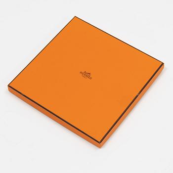 Hermès, a 'Fleurs d'Indiennes' silk scarf.