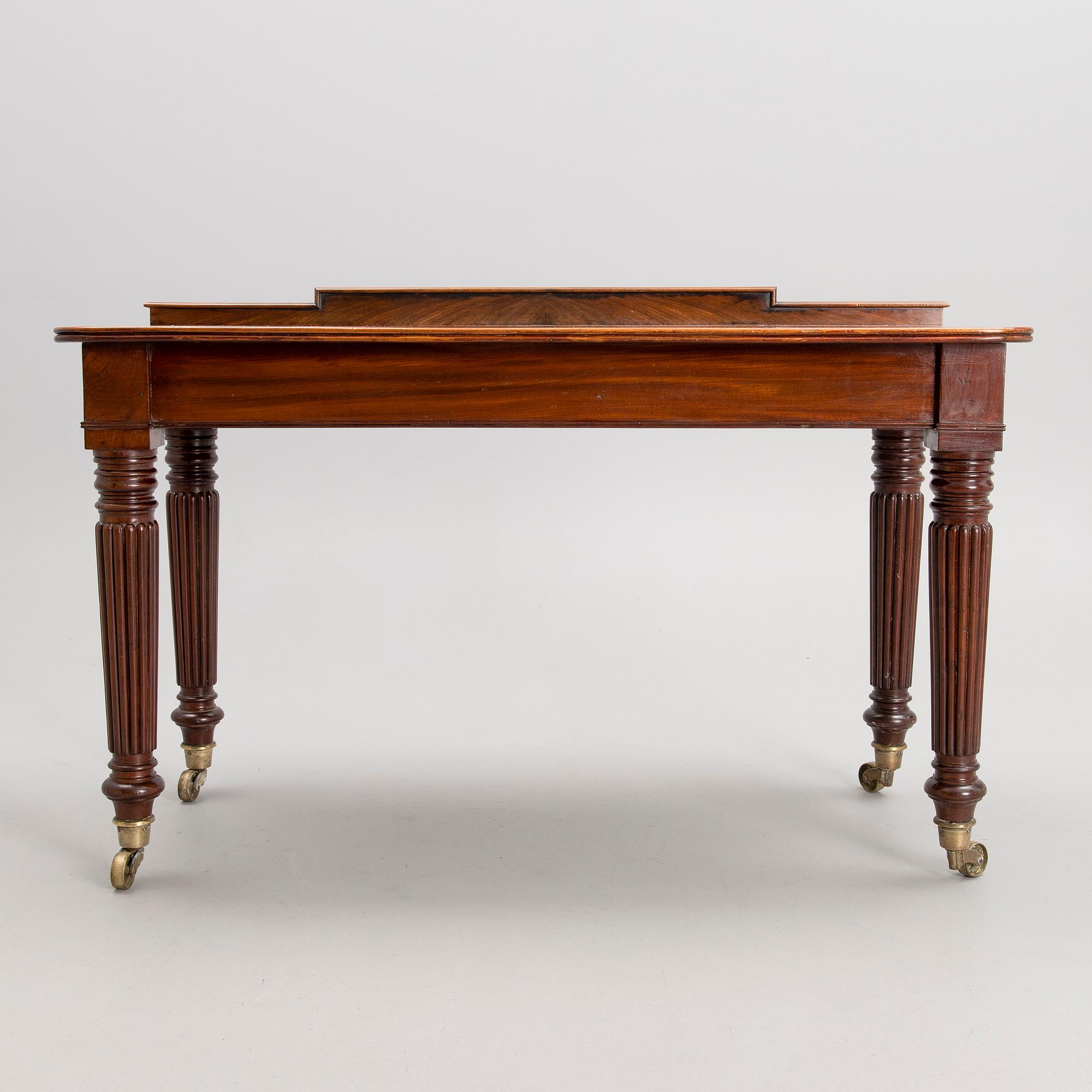 A Victorian mahogany table, latter half of the 19th century.