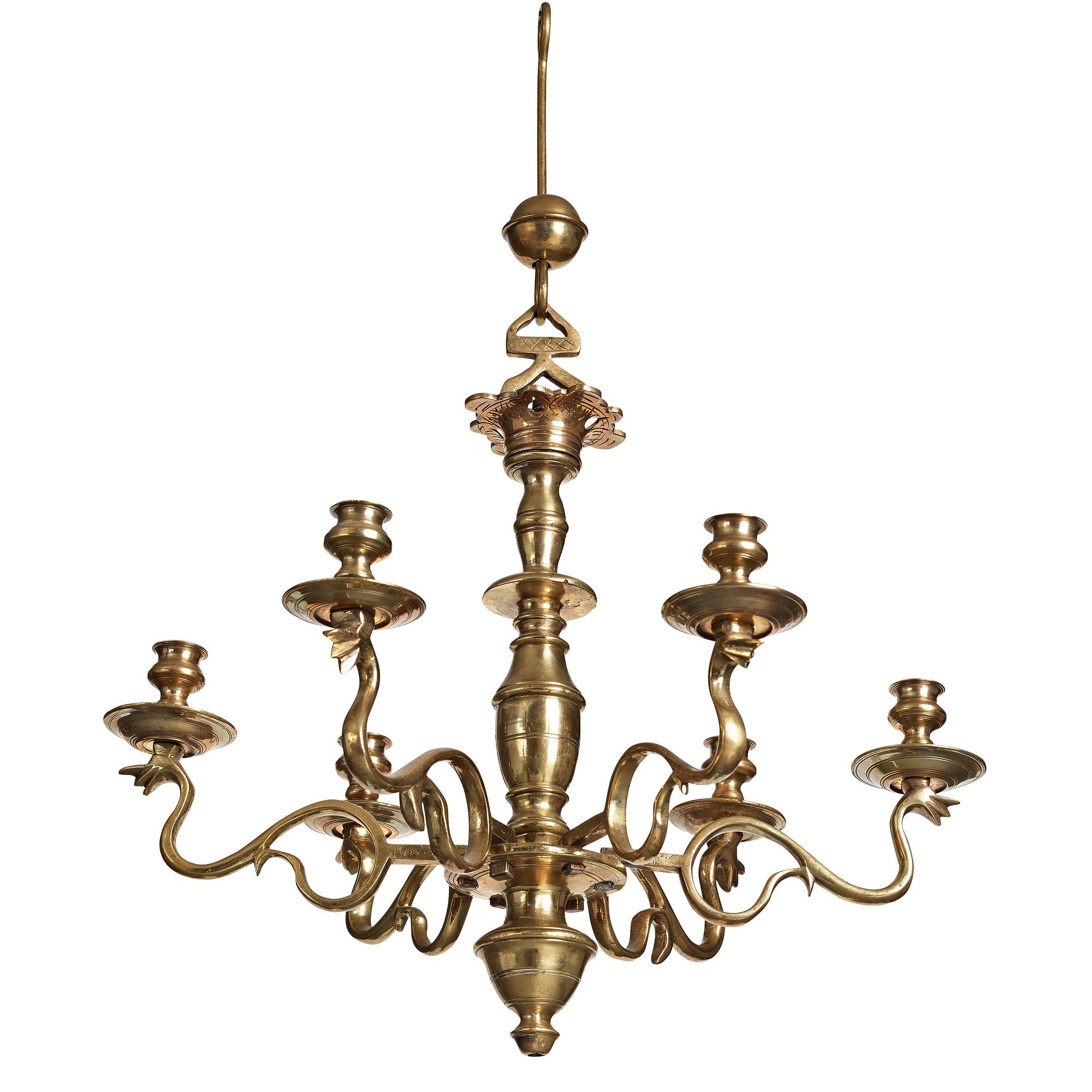 A six-light 18/19th century brass chandelier.