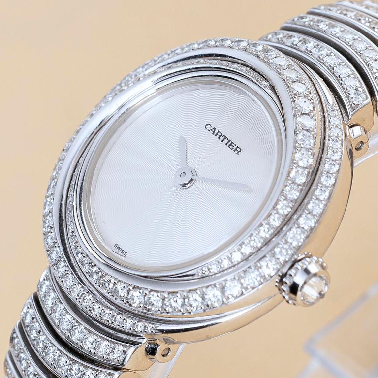 Cartier, Trinity, "Diamond set case and bracelet", ca 2000.