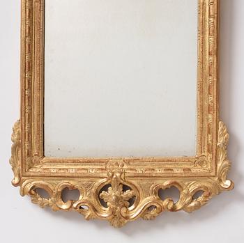 A rococo giltwood mirror by J. Åkerblad (master in Stockholm 1758-99).