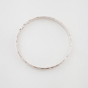 GÖRAN KUHLIN, Göteborg, 1990, en armring.