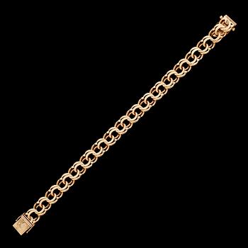 ARMBAND, 18 k guld, bolidenguld, 1947. Total vikt ca 31 g.