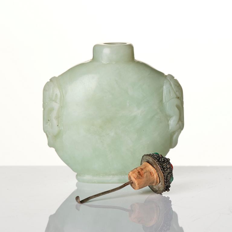 A group of three Chinese snuffbottles, stone, glass and bone, late Qing dynasty / around 1900.