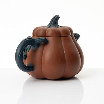 A Chinese yixing 'gourd' teapot, four cups and three saucers, 1980s.