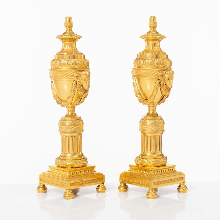 A pair of French Louis XVI style gilt-bronze casolettes, later part 18th century.