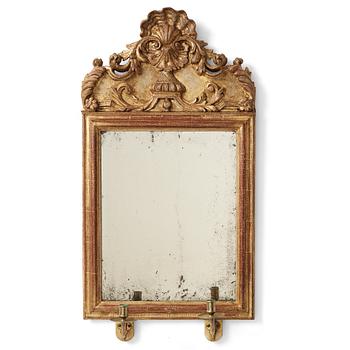 99. A late Baroque 18th century two-light girandole mirror.