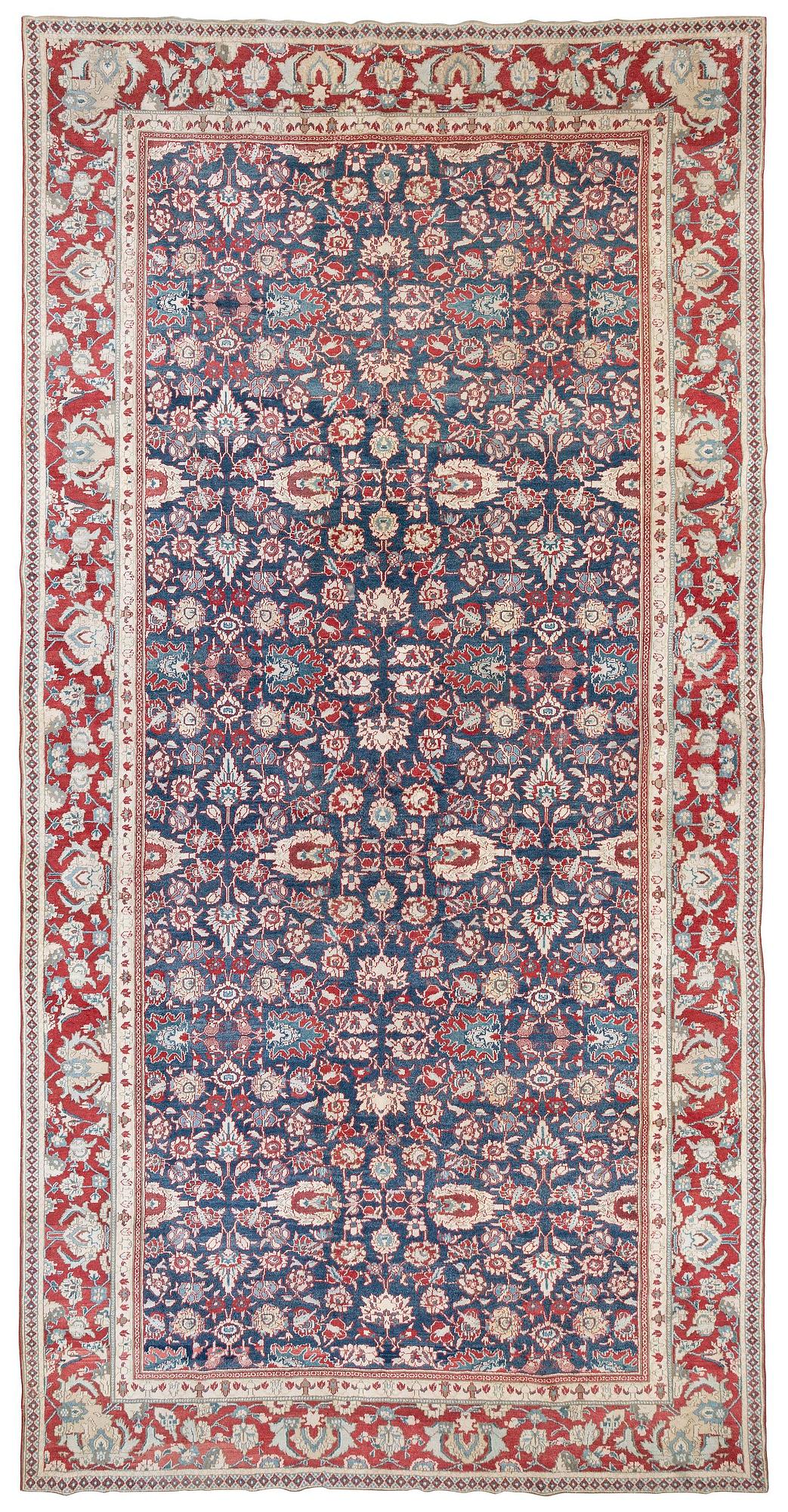 An antique cotton Agra of 'Ziegler Mahal' design, Northern India, c. 647 x 330 cm.