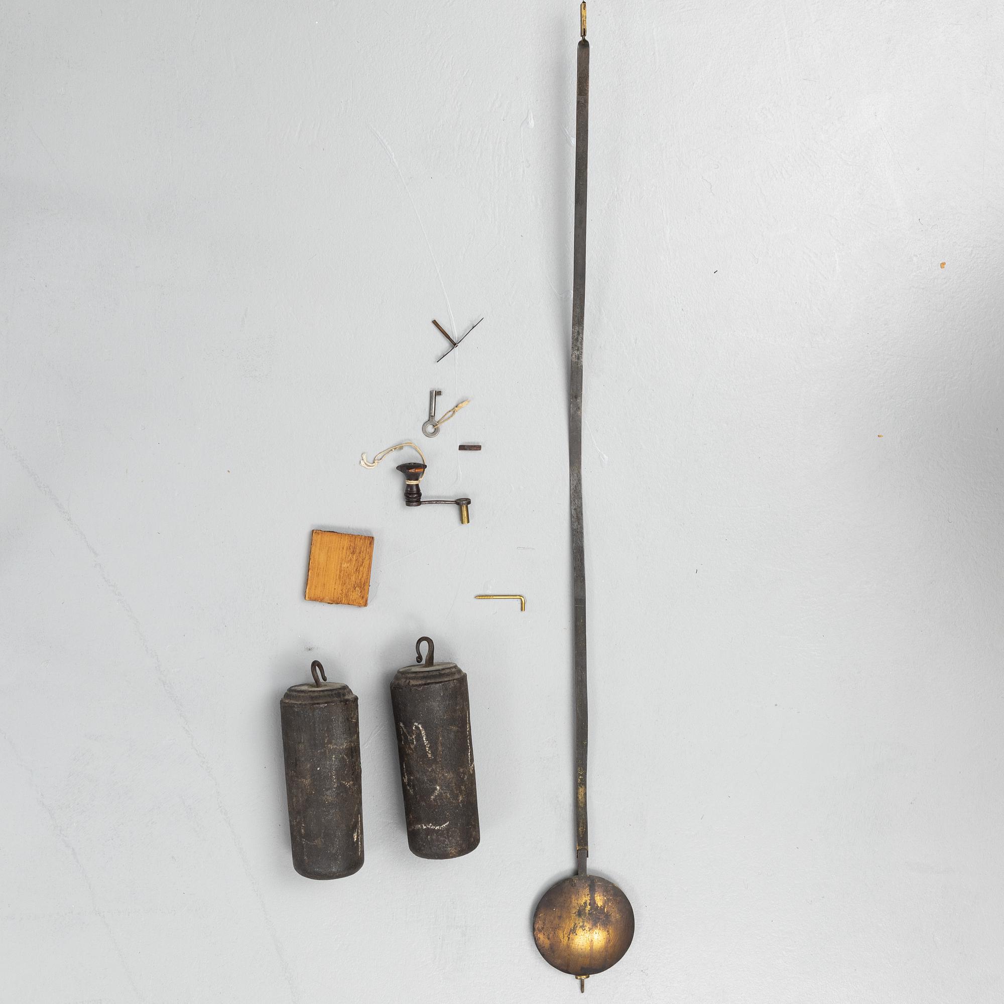 A mahognay long case clock from around the year 1800, H Bunyan Lincoln.