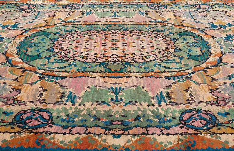 A CARPET, knotted pile, ca 488-491 x 347,5-350,5 cm, probably France, first third of the 20th century.