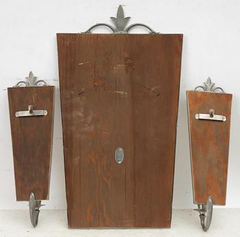 A mirror and pair of wall sconces, Sweden, 1932.