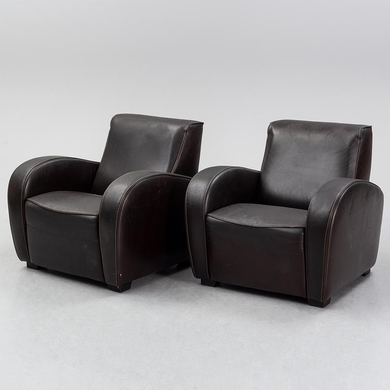 A pair of Italian leather armchairs from  Industria Divani e Poltrone, 21st-century.