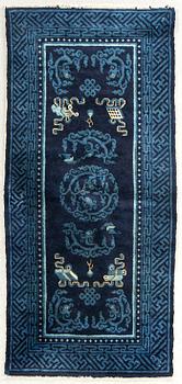 An antique Chinese Pao-Tou carpet ca 139 x 66 cm.