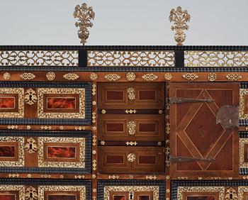 A Baroque 17/18th century cabinet, on later stand.