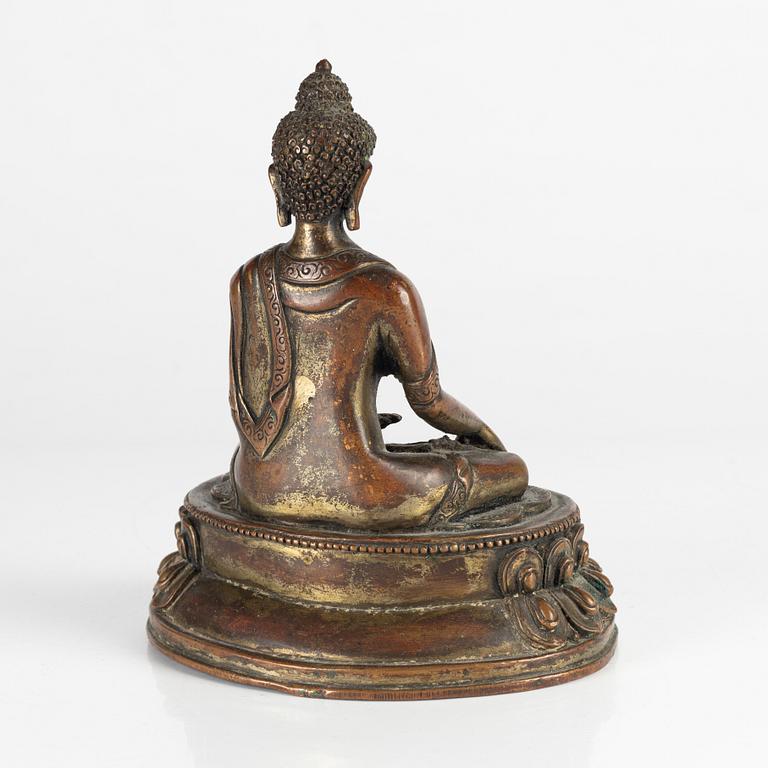 Buddha Shakyamuni, kopparlegering. Tibet, 1900-talets början.