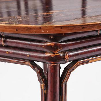 A Chinese bamboo horseshoeback armchair, late Qing dynasty.