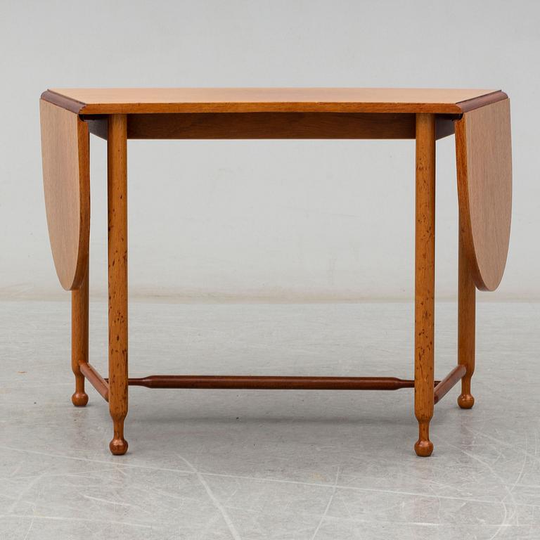 JOSEF FRANK, a model 1333 mahogany table from Firma Svenskt Tenn.