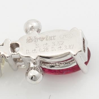 Bracelet 18K white gold set with faceted rubies, emeralds, sapphires, and round brilliant-cut diamonds.