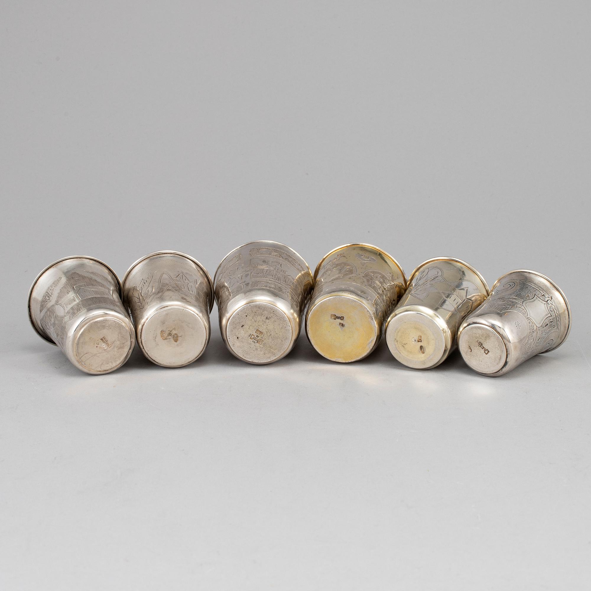 A set of six Russian 19th century parcel-gilt silver vodka cups.
