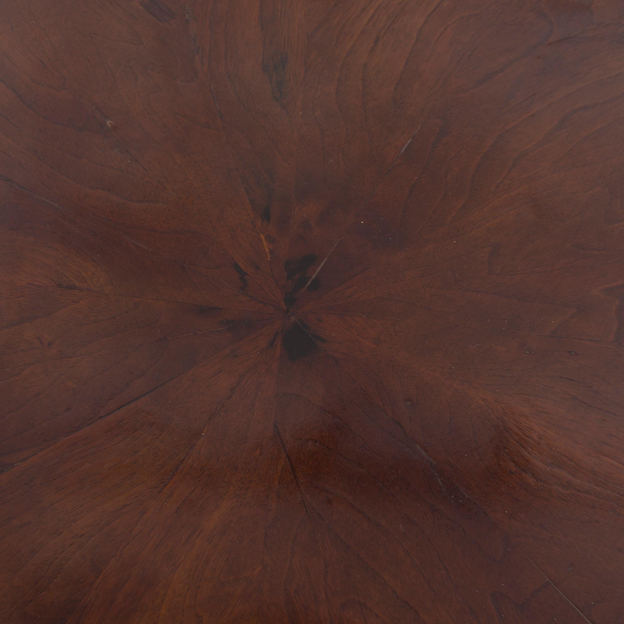 AN ART DECO STYLE TABLE, from the middle of the 20th century.