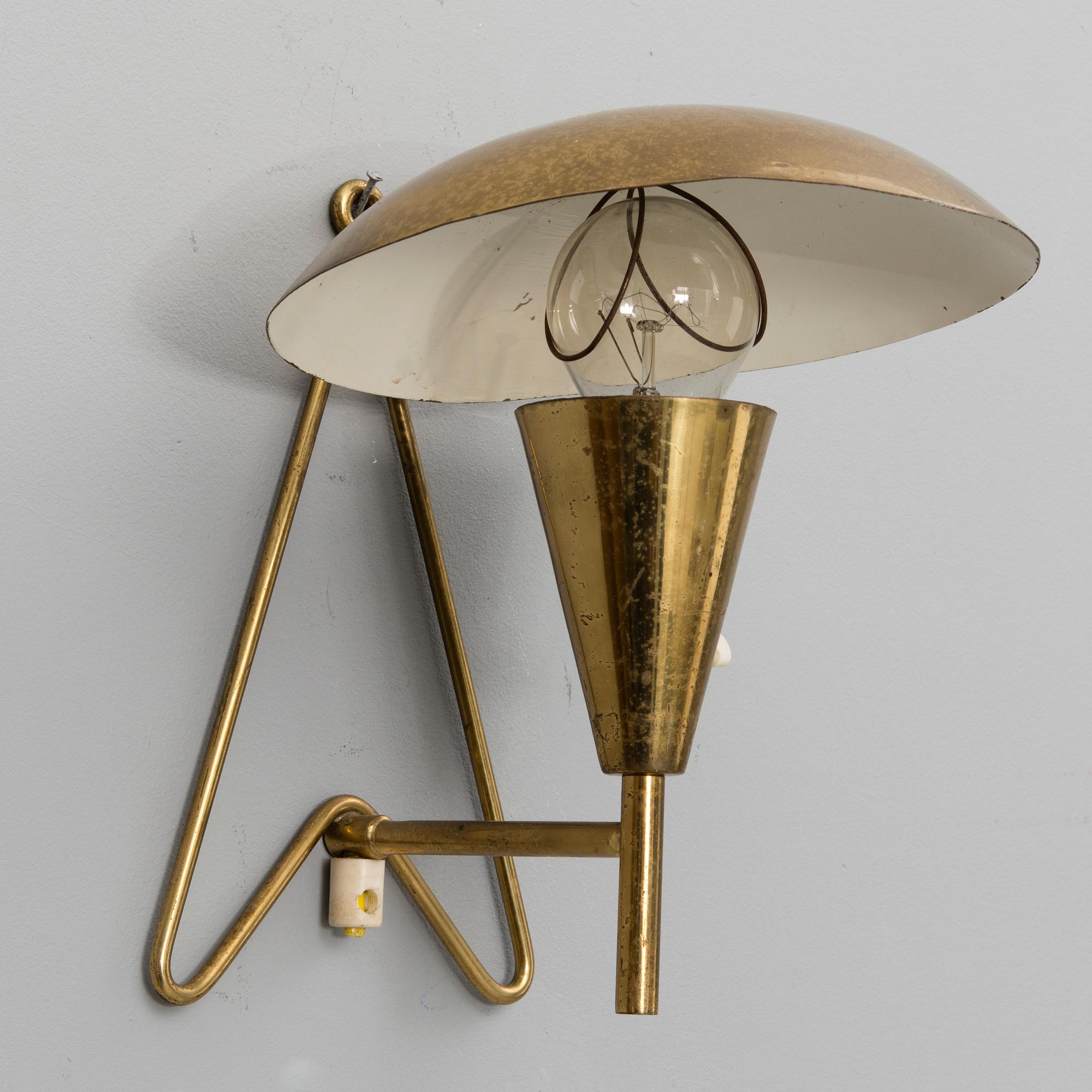 A mid-20th century wall light / table lamp, model EV 57 for Itsu, Finland.