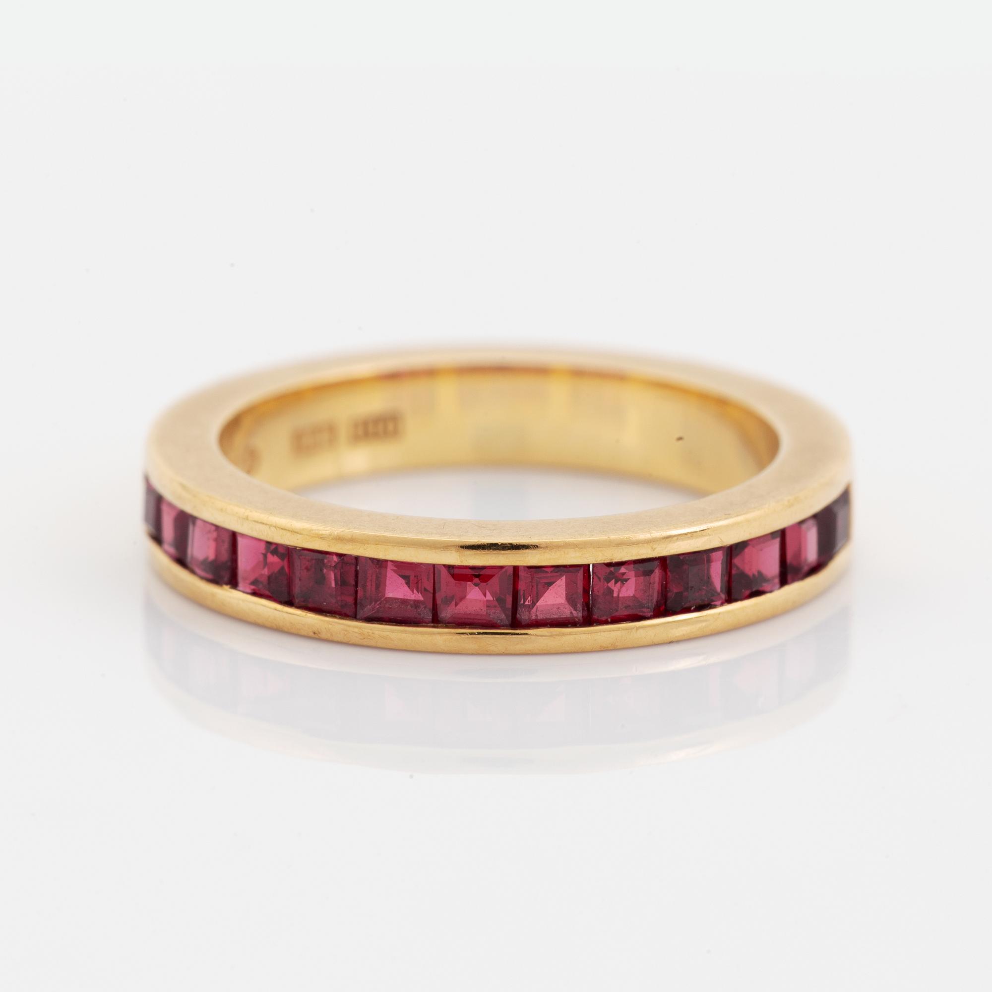 18K gold and step cut ruby ring.