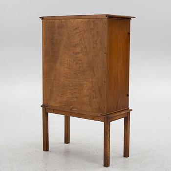 Oscar Nilsson, attributed to, a Swedish Modern oak cabinet, likely executed by Åfors Möbelfabrik, 1940s.