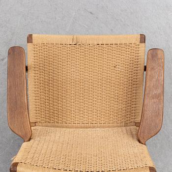 A model CH-25 easy chair by Hans J Wegner.