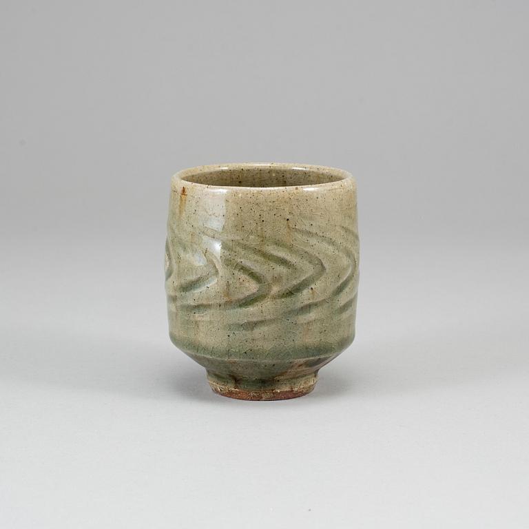 TATSUZŌ SHIMAOKA, a celadon glaze vase, signed.