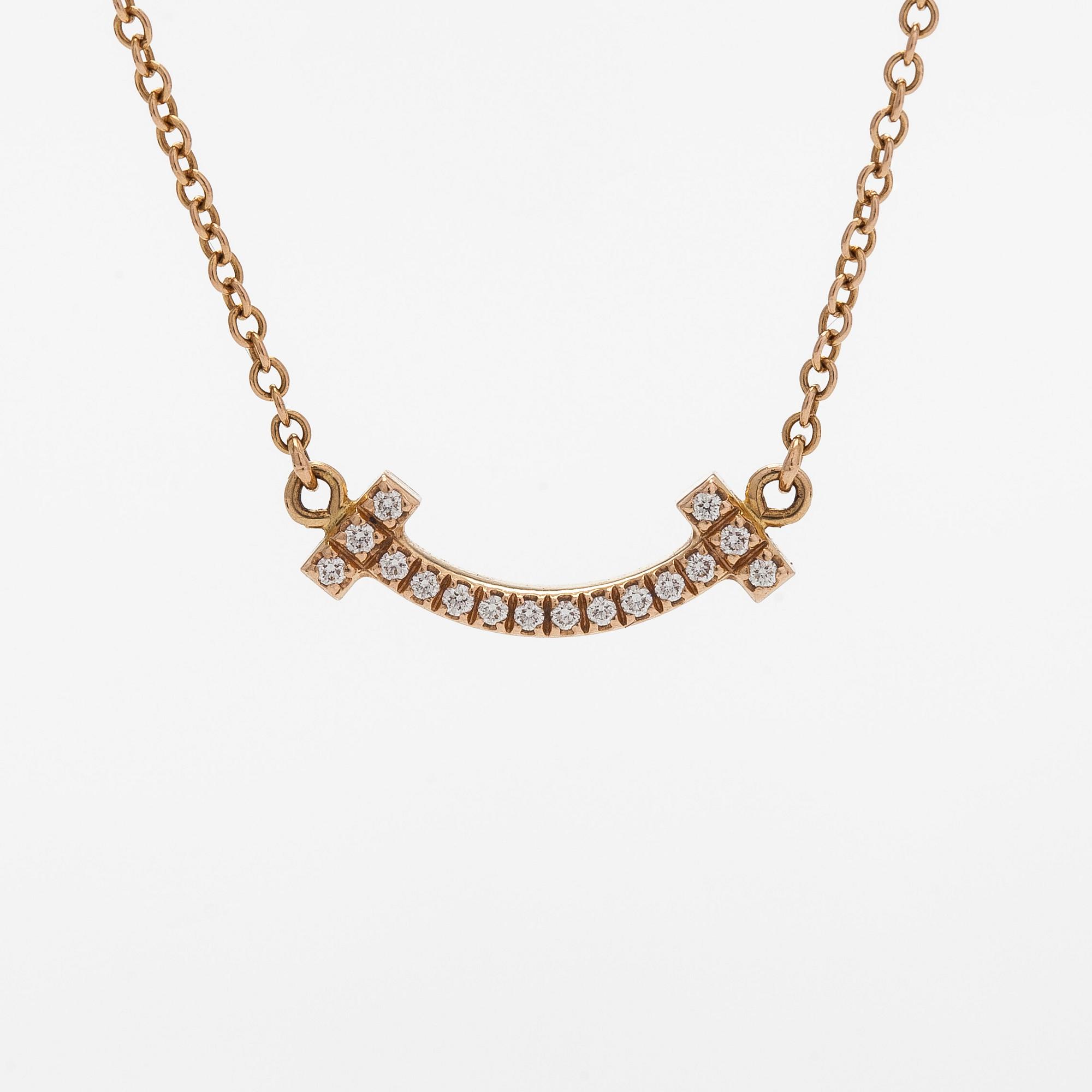 Tiffany & Co, kaulakoru, "T Smile", 18K kultaa ja briljanttihiottuja timantteja.