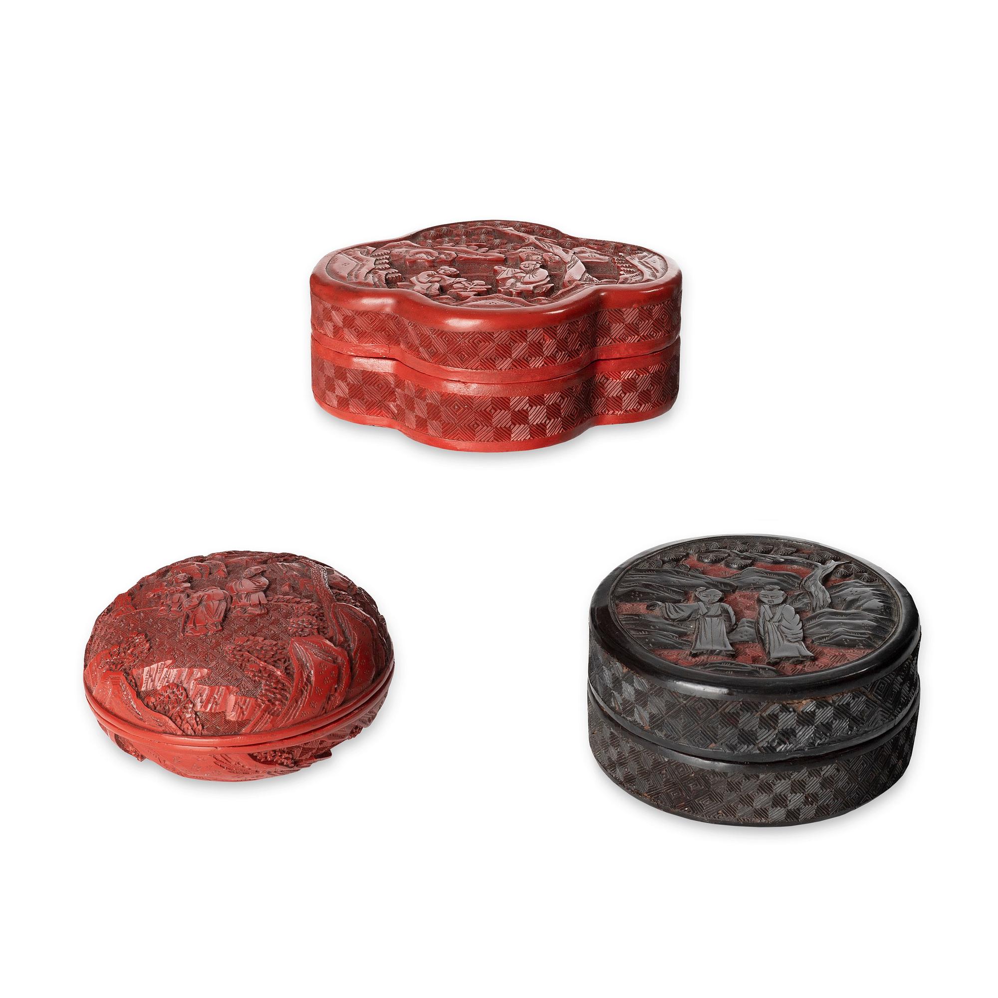 A group of three Chinese lacquer boxes with covers, late Qing dynasty.