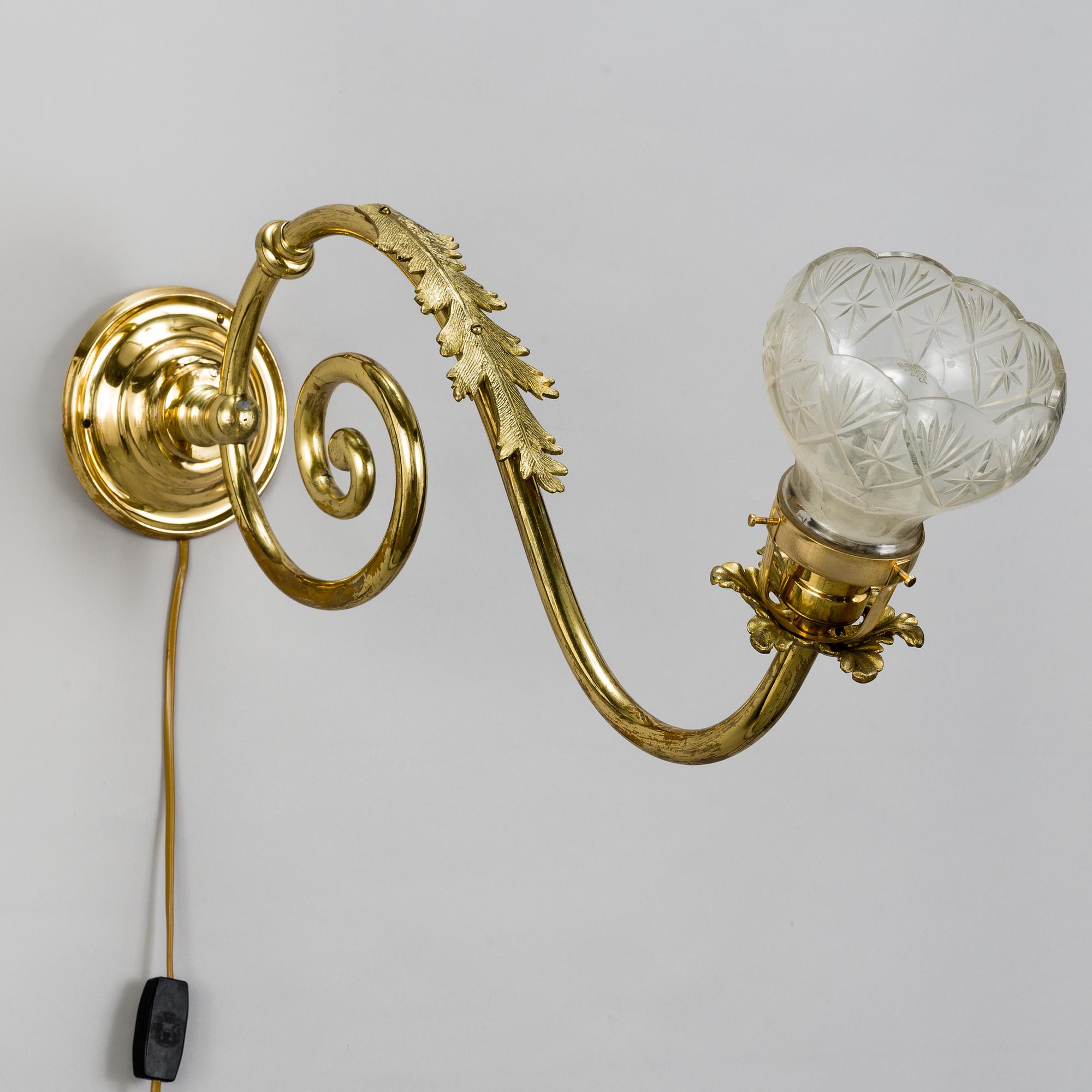 Three mid 20th century brass wallscones.