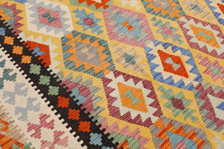 A kilim carpet, ca 486 x 304 cm.