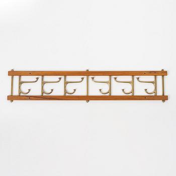 Klädhängare, "Dekorativ", Skoglunds metallgjuteri, Anderstorp, 1950/60-tal.