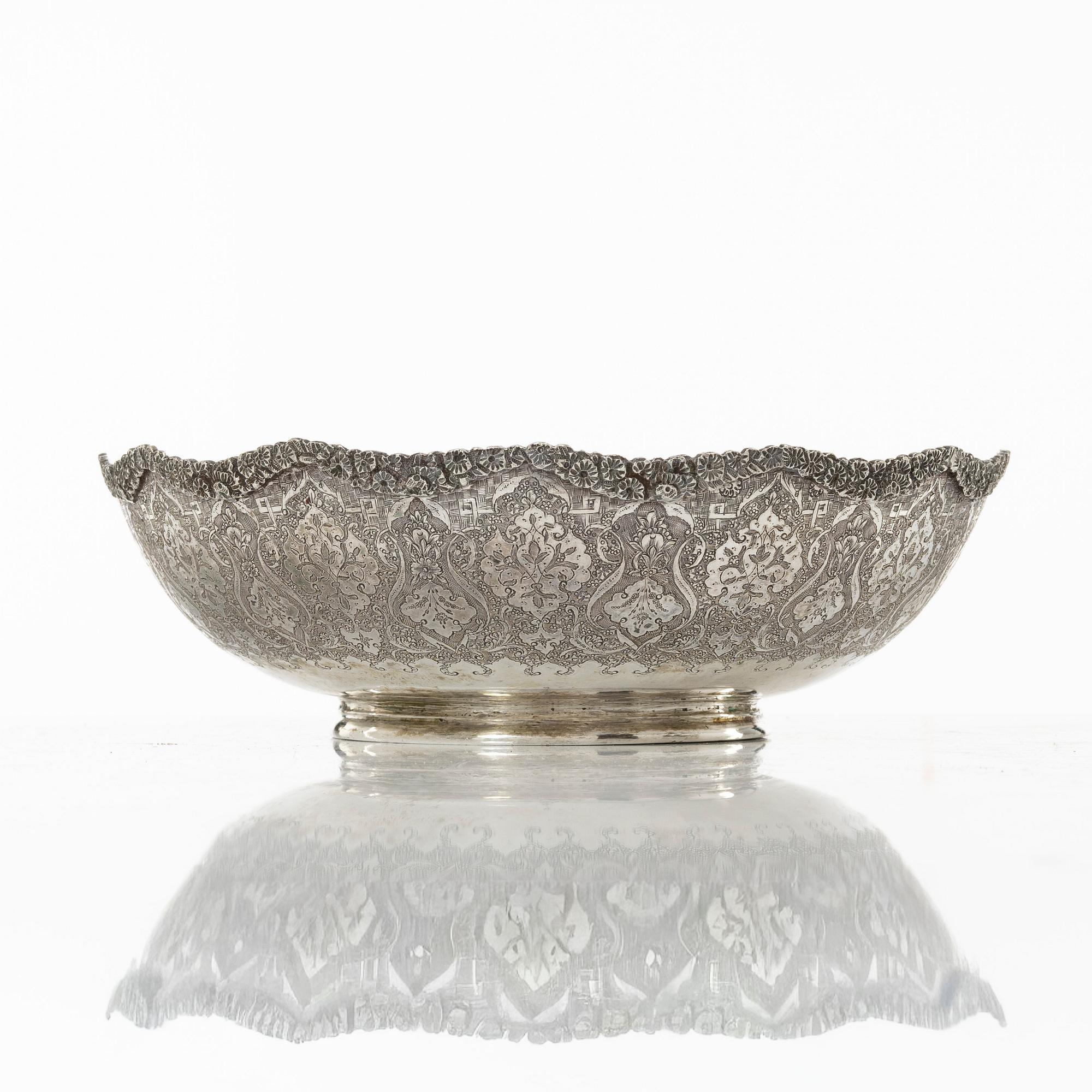 A Persian silver bowl and a silver bucket, 20th century.