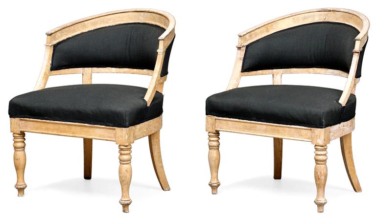 A pair of Swedish late Empire armchairs.