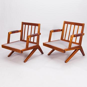 OLAVI HÄNNINEN, A 1960s 'Bumerang' armchairs for HMN Huonekalu Mikko Nupponen, Lahti, Finland.