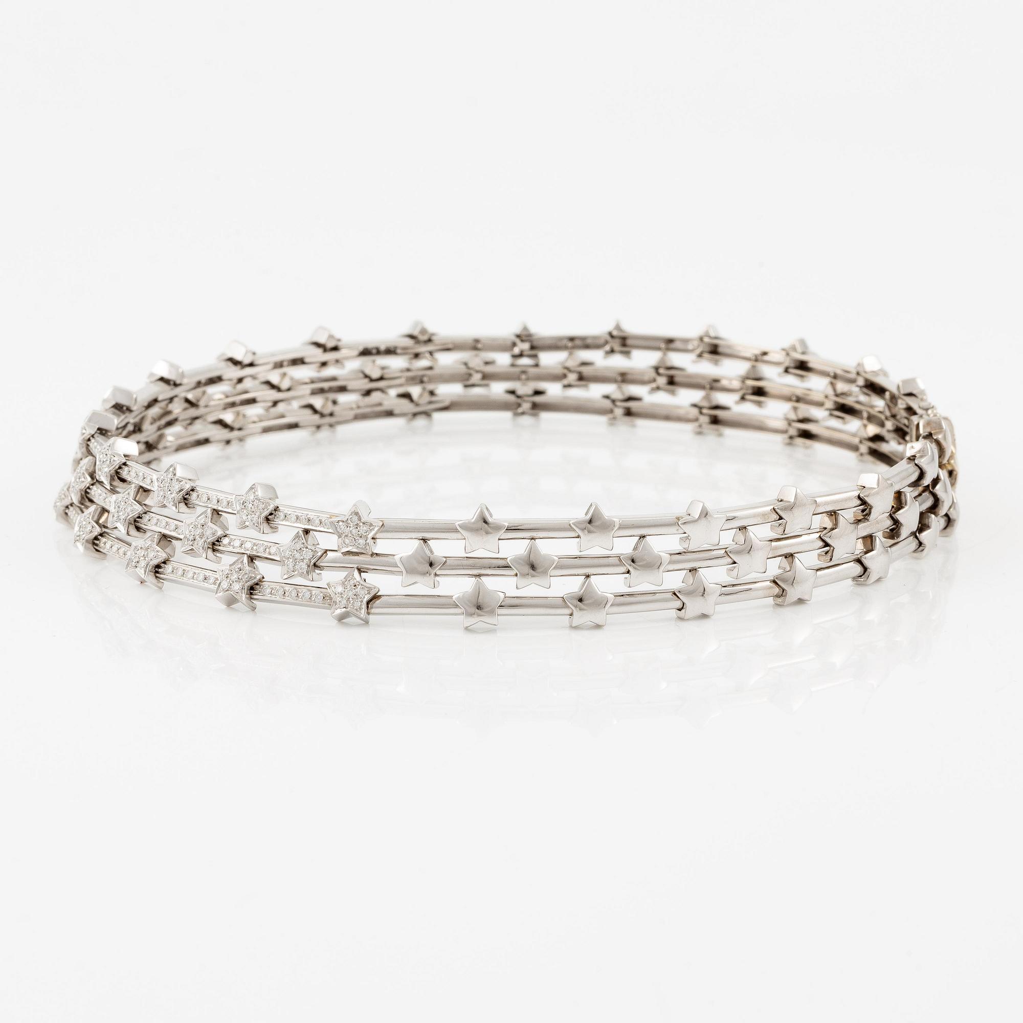 An 18K white gold necklace with round brilliant-cut diamonds.