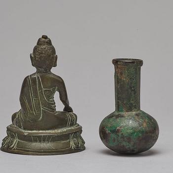 A Tibeto Chinese figure of buddha, 19th Century. A bronze vase, Ming dynasty or older.