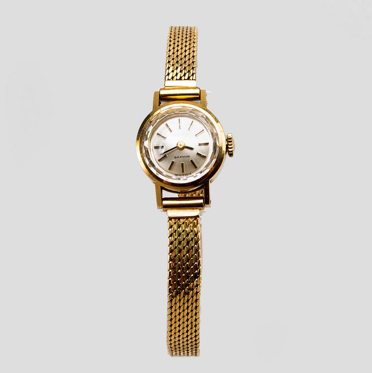 A Tissot Saphir ladies 18 Carat gold wrist watch 11 mm total weight ca 25 gr.