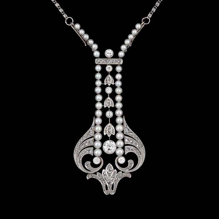 A natural pearl and diamond necklace. Ca 1910.
