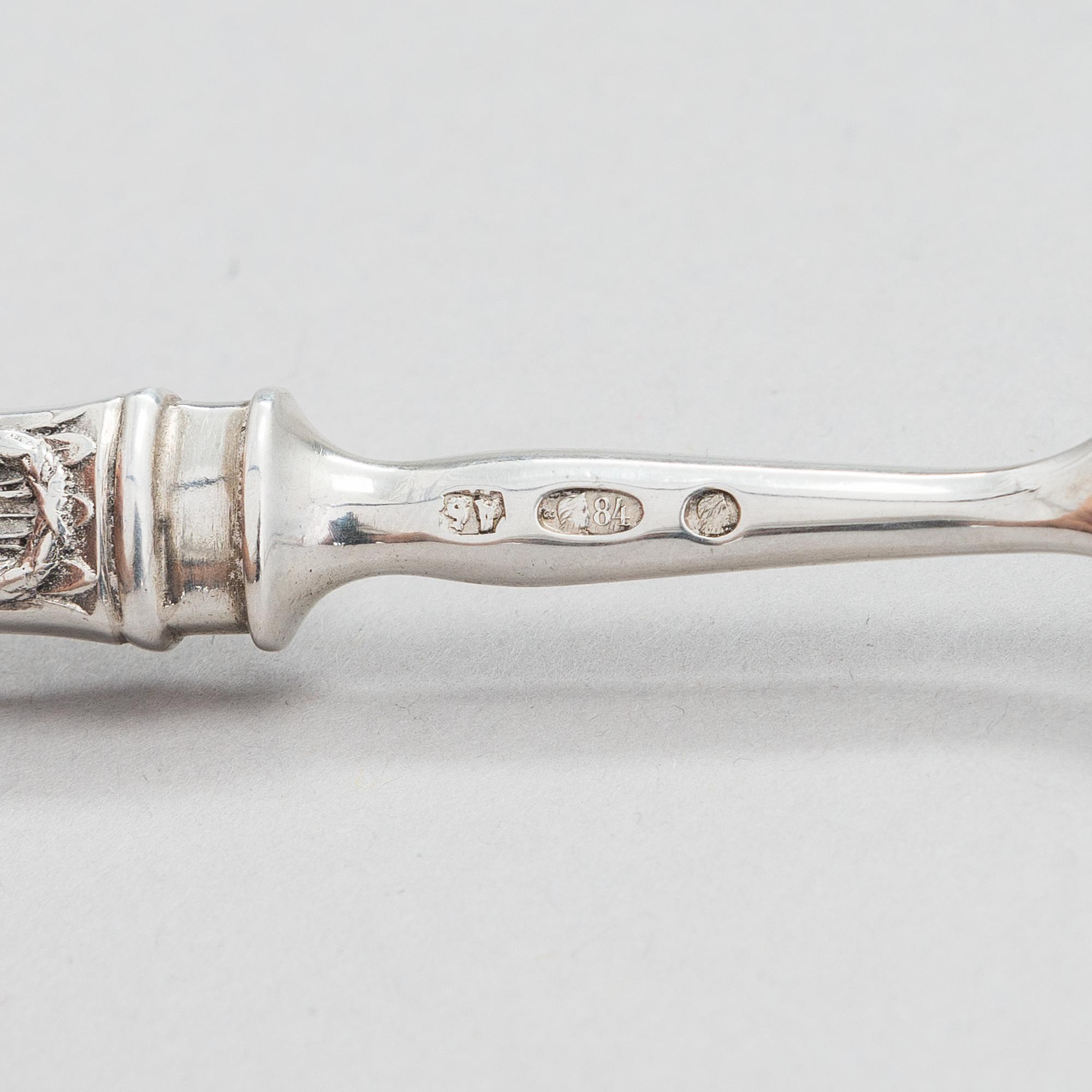 Four pieces of Russian silver cutlery.