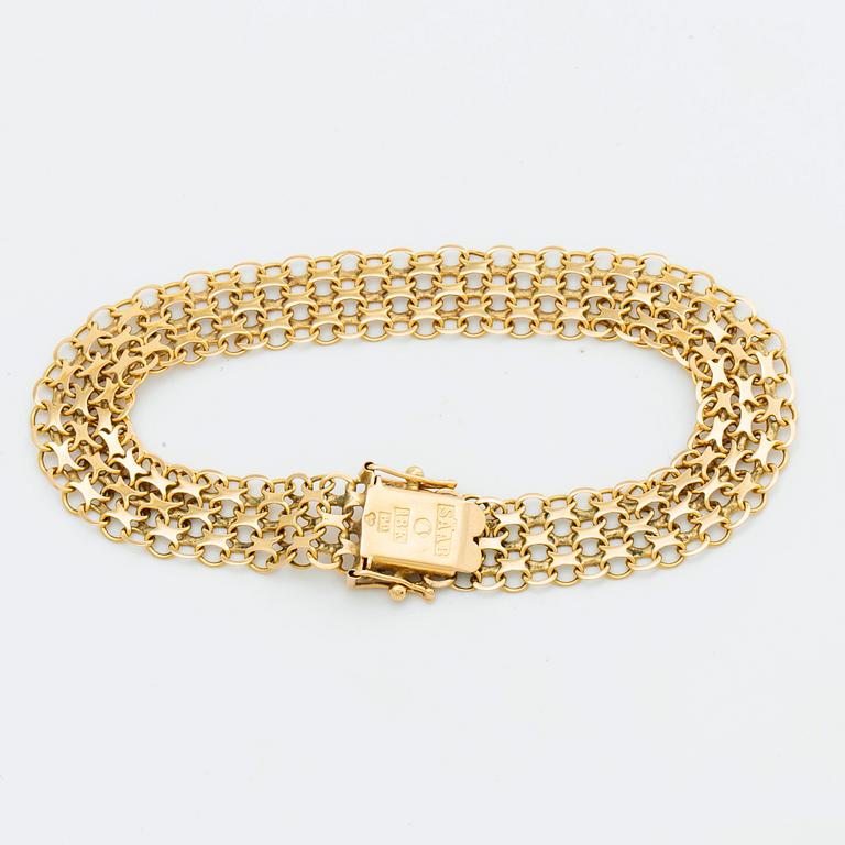 A Swedish 20th century 18K gold bracelet mark of Stockholms ädelsmide 1965, weight ca 11 gr, length 19 cm.